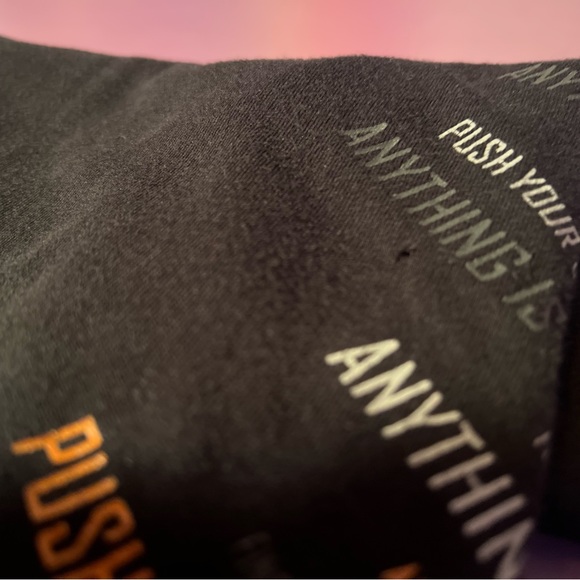 Small black t shirt with writing on the front. - Picture 3 of 4